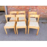 A set of six Dinette ash single dining chairs, with drop-in seats.