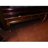 A mahogany occasional table, with two frieze drawers, raised on cabriole legs, 44cm H, 118cm W, 59cm