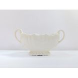 A Crown Devon cream pottery fluted twin handled vase, 41cm W.