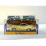 A Gateway Global die cast model of a Porsche Carrera, scale 1:18, Minichamps die cast model of a