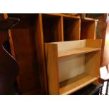 A pine two section open bookcase, of adjustable shelves, 121cm H, 183cm W, 24cm D., and two chip