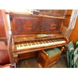 A Victorian rosewood cased upright piano, stamped Burling & Burling, with fine fret work panel,