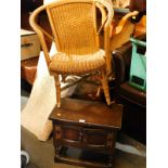 A Stanley Wood Ltd of Olney oak shoe cupboard, raised on turned supports united by a box