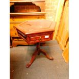 An hexagonal mahogany occasional table, with single frieze drawer, raised on a baluster and ring