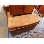 A 19thC wood effect tin cabin trunk, 77cm wide, 56.5cm deep, 46cm high.