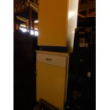 Two 1960's/70's yellow and white painted kitchen cupboards, raised on black fronted plinth bases,
