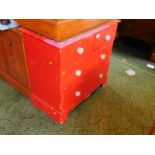 An Edwardian later red painted chest, of two short over two long drawers, raised on bracket feet,