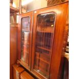 A Victorian and later mahogany display cabinet, converted from a bookcase top, with two glazed