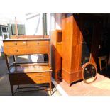 An Edwardian mahogany and inlaid three piece bedroom suite, comprising a double wardrobe, the