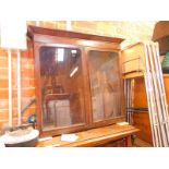 A Victorian mahogany glazed wall cabinet, with velvet lined interior, lacking shelves, 76.5cm H,