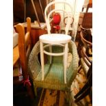 A green painted cane tub chair, together with a white painted bent wood child's balloon back