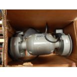 A Hilka 6" bench grinder, complete with two 6" grinding wheels, tool rests and eye shields, 370w,