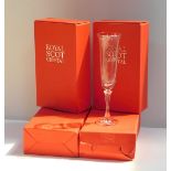 Eight Royal Scot crystal cut glass champagne flutes, boxed.