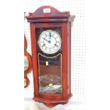 A Lincoln 31 day wall clock, with brass and enamel dial bearing Roman numerals, coil strike, the