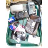 A Canon Ixus M-1 digital camera, Ricoh FF-9S camera, Nikon L35 AF2 camera and a Boots Focus C35AF