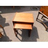 A G-Plan teak nest of occasional tables, largest 53cm x 43cm.