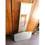 A mid 20thC Perry Globe Brand overmantel mirror, inset bevelled glass, 38cm H, 66cm Dia., together