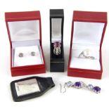 Various jewellery 925 etc., a crossover ring set with faux pearl, size R, a dress ring claw set with