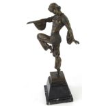 A bronze figure of an Art Deco dancer, on a black veined marble tapering base, bearing name D.H.