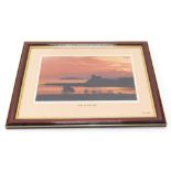 After Nick Gordon. Sunrise over Duart Castle, photographic print, 32cm x 52cm, glazed and framed.