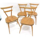 A set of four vintage late 1960's/early 1970's Ercol style elm dining chairs, each with tapering