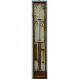 An Admiral Fitzroy oak cased barometer, of rectangular form, set with various thermometers,