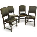 A set of four oak dining chairs, each with overstuffed backs and drop-in seats, on turned front
