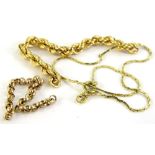 Various loose and part chains, comprising a rope twist chain, yellow metal, unmarked, a part curb
