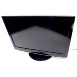 An LG 43" colour television, in black trim, 421H3000, with wire and remote control.