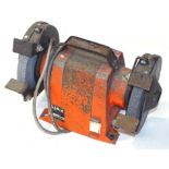 An Agax Crusader JAAR3 model DS7150T electric bench grinder, in orange, 24cm high, 31cm wide, 13cm