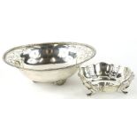 A George V silver dish of floral form, partially pierced on triple onslow shaped legs, Birmingham