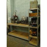 A two drawer metal filing cabinet, and a metal racking table, with two wooden sections, 94cm high,