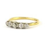 A five stone diamond ring, set with graduated round brilliant cut diamonds, approx 0.10cts