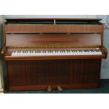A modern Eisenberg over strung upright piano, in polished case marked to the interior, 106cm high,