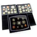 A United Kingdom 2010 proof coin set, in outer box and card packaging, another for 2011 and a