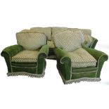 A large green velvet three piece suite, each cushion decorated with textured velvet Gothic