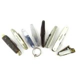 Various pen knives etc., a mother of pearl handled cigar cutter with base metal end, 4cm wide, a