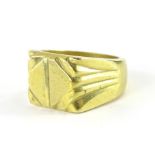 Withdrawn prior to sale by vendor. An 18ct gold signet ring, of chunky form, size W, 17.5g.
