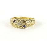 A 9ct gold dress ring, set with blue and white stones, size L, 2.5g all in.