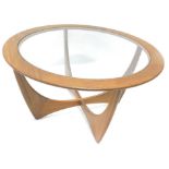 A vintage 1970's G Plan coffee table, of circular form, on shaped legs, 46cm high, 84cm diameter.