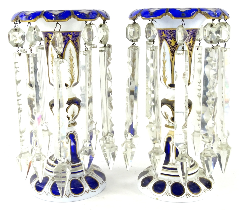 A pair of 19thC Bohemian blue, clear and milk glass lustres, each with floral tops and inverted