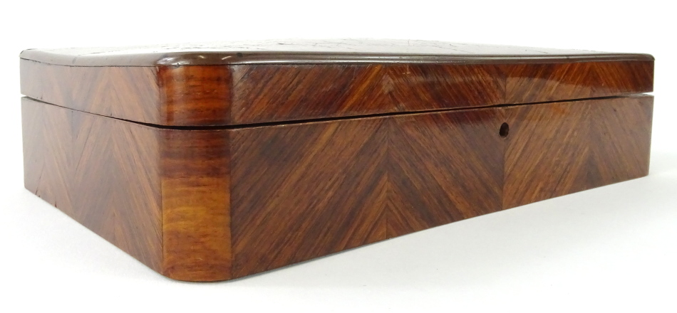 A 19thC kingwood and parquetry box, of rectangular form, with a slender domed lid, feather banded