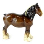 A 20thC Beswick pottery shire horse, in brown and white colourway, printed marks beneath, 22cm