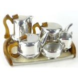 A 20thC Picquot ware six piece service, comprising coffee pot, 21cm high, teapot, water pot, jug,