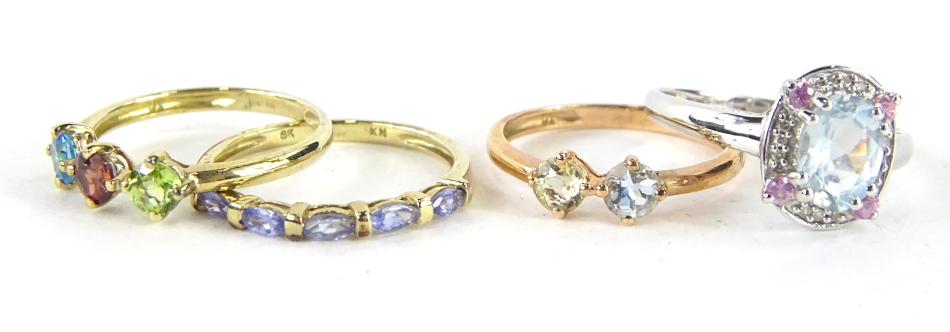 Four various dress rings, set with coloured stones, size O, 9ct etc. (4)