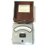 An Elect DC volt meter, number 3897, in fitted case, 10cm high, 26cm wide, 26 deep.