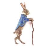 A cold painted model of a Beatrix Potter type rabbit with a walking stick, Bergman mark