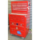 A Snap-On portable tool cabinet, of rectangular form in red, on a truckle wheeled base, with side