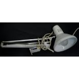 A vintage Anglepoise lamp, in white with shaped shade, 18cm wide, on an articulated metal stem,