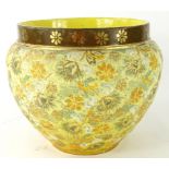 An early 20thC Doulton Slaters patent jardiniere, of shouldered circular form, decorated with a